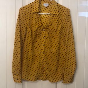 Women’s Button Up blouse.